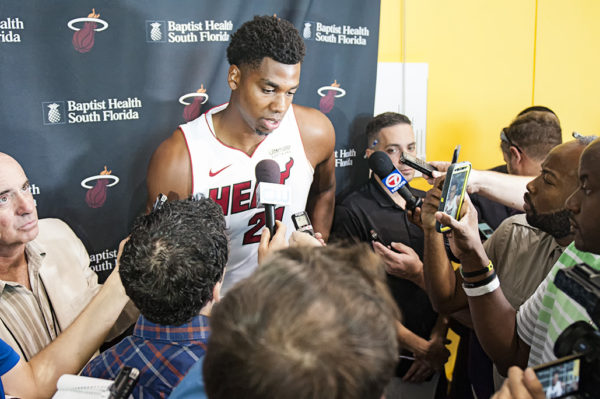 Heat center, Hassan Whiteside, gives an interview surrounded by media