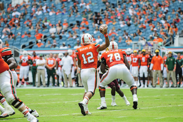 Hurricanes QB, Malik Rosier, throws a pass against Bethune-Cookman