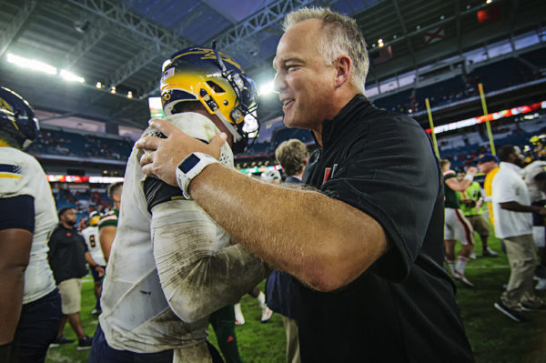 Mark Richt gives words of encouragement to Logan Woodside