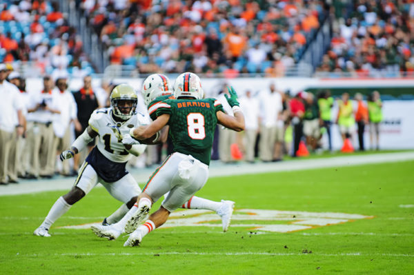 Braxton Berrios tries to make a cut after catching a pass