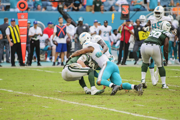 Cam Wake (91) sacks Josh McCown (15)