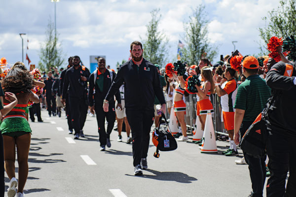 Miami Hurricane players participate in the Canes Walk