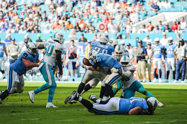 Charles Harris swings Matt Cassel around for the sack