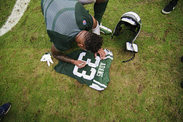 Jamal Adams signs his jersey