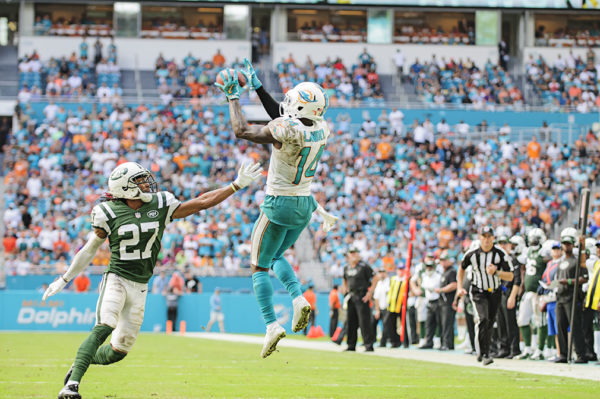 Jarvis Landry (14) leaps to catch a pass