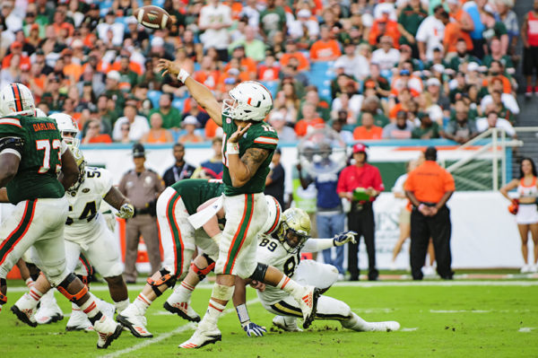 Malik Rosier launches a pass down field