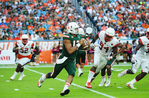 Malik Rosier looks to throw on the run