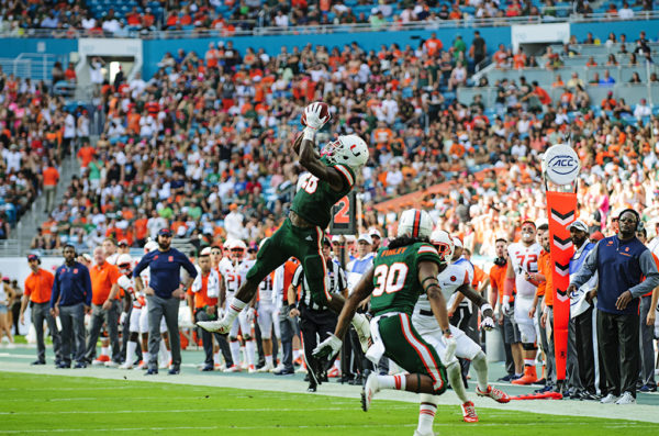 Michael Jackson (28) intercepts the ball