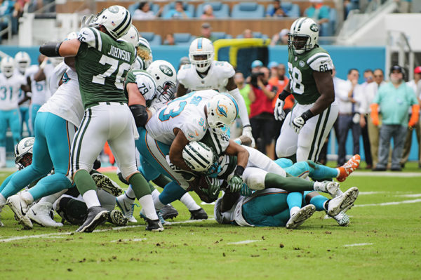 Ndamukong Suh (93) tackles Matt Forte (22)