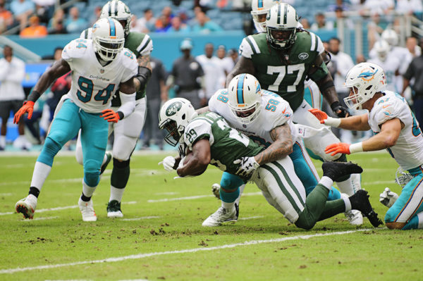 Rey Maualuga (58) tackles Bilal Powell (29)