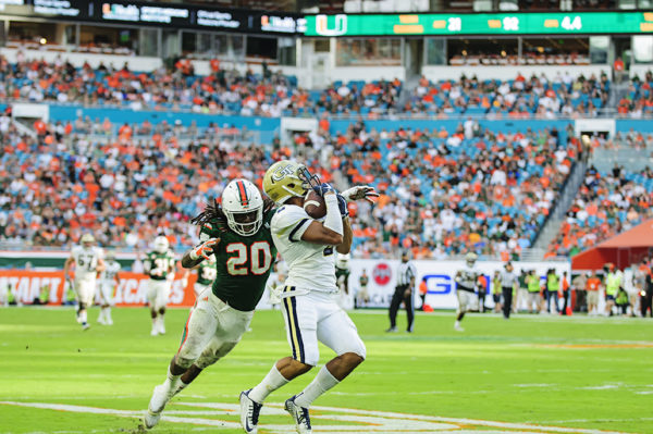 Ricky Jeune (2) catches a deep pass