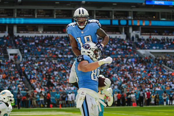 Rishard Mattews jumps on Phillip Supernaw's back to celebrate the touchdown