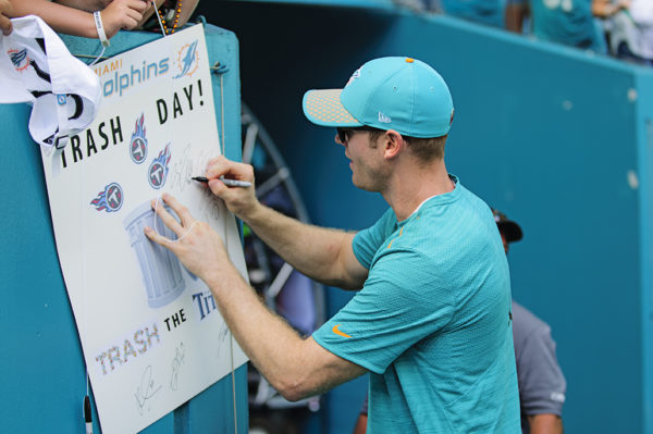 Injured Dolphins QB, Ryan Tannehill, signs autographs for fans