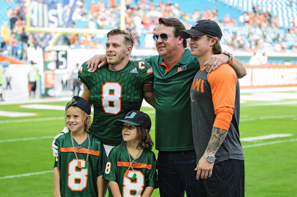 Braxton Berrios poses with family and friends on Senior Day