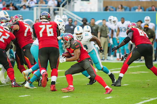Doug Martin (22) tries to find some running room