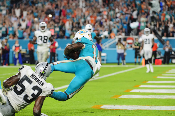 Jarvis Landry (14) twists his way in for a touchdown