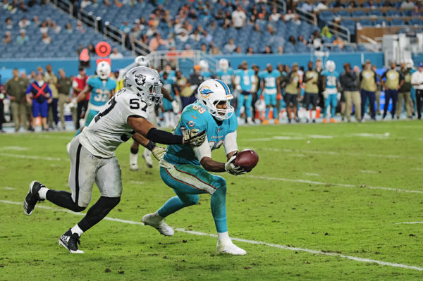 Dolphins tight end Julius Thomas (89) hauls in a pass from Jay Cutler