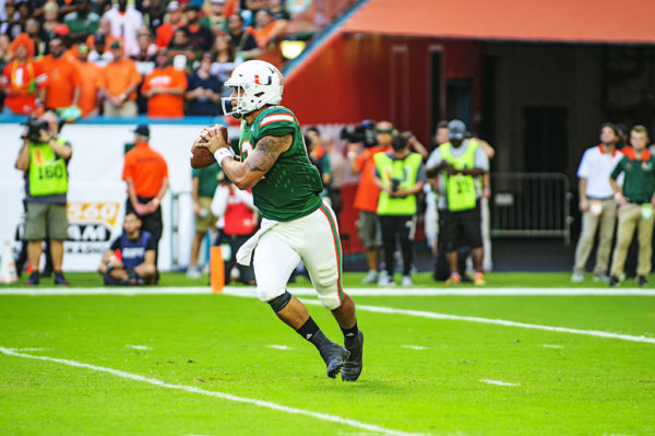 Malik Rosier (12) scrambles to his left while he looks for a receiver