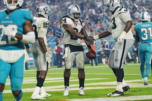 Marshawn Lynch (24) shook the hands of all his teammates after his touchdown