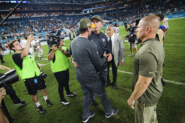 head coaches meet after the game