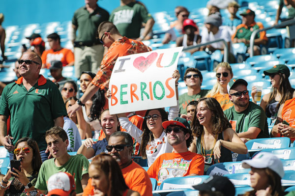 A fan holds a sign up for Braxton Berrios