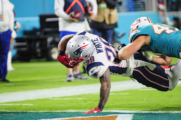 James White (28) lunges in for the touchdown