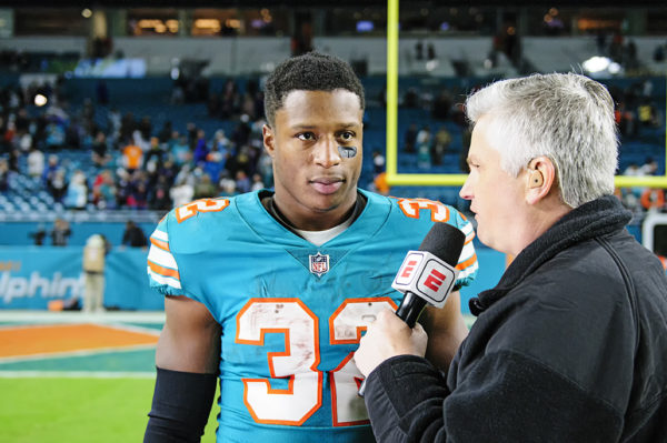 Kenyan Drake gives an interview after the victory