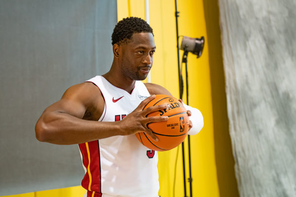 Dwyane Wade poses for his photo