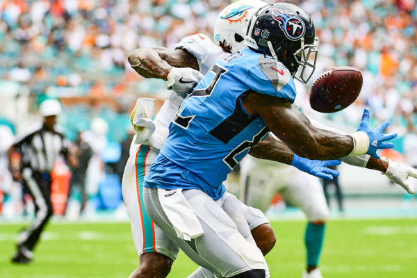 Miami Dolphins cornerback Bobby McCain (28) breaks up the pass to Tennessee Titans tight end Delanie Walker (82)