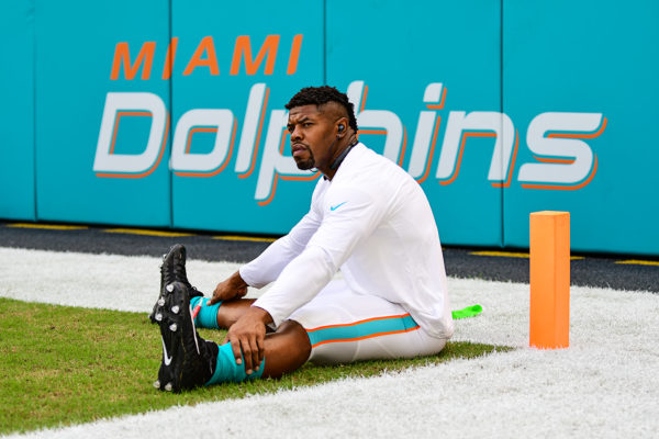Miami Dolphins defensive end Cameron Wake (91) stretches prior to the game