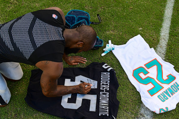 Oakland Raiders defensive back Dominique Rodgers-Cromartie (45) writes a message on his jersey