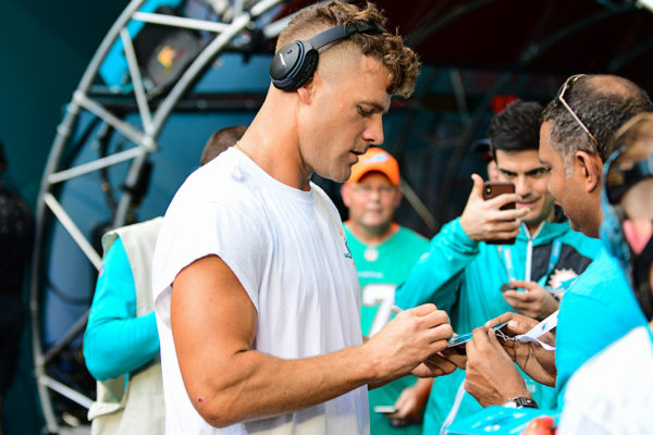 Miami Dolphins linebacker Kiko Alonso (47) signs autographs for the fans