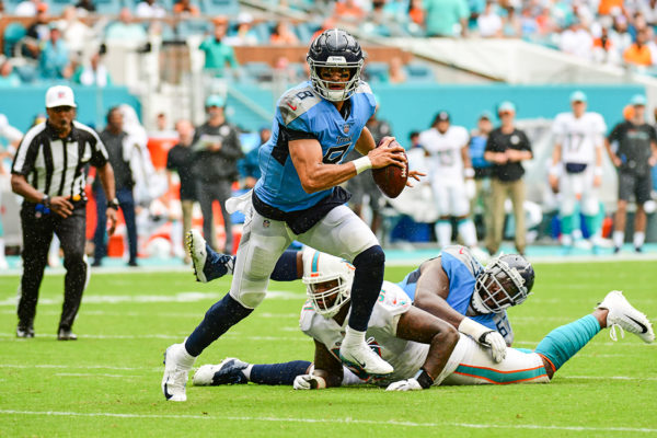 Tennessee Titans quarterback Marcus Mariota (8) runs out of the pocket