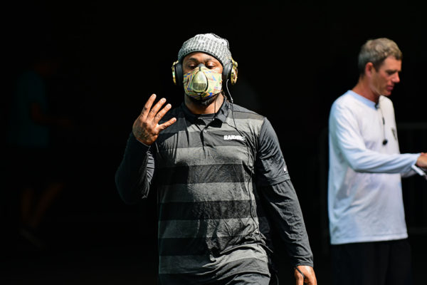 Oakland Raiders running back Marshawn Lynch (24) comes out to warm up prior to the game against the Miami Dolphins