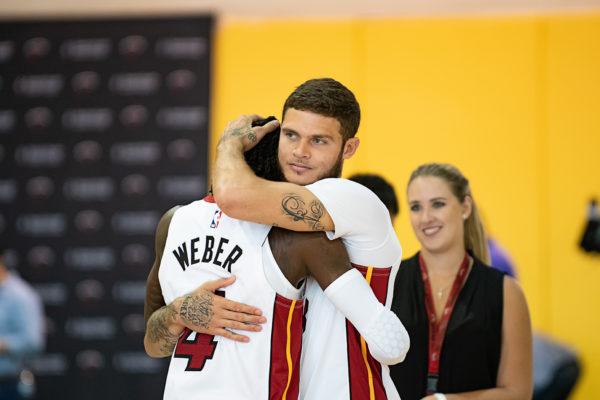 Tyler Johnson jokingly gives Briante Weber a hug