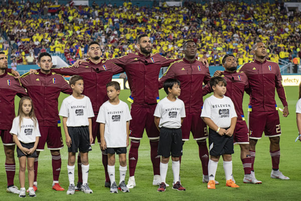 Venezuela players sing their national anthem