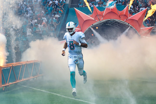 Miami Dolphins quarterback Brock Osweiler (8) runs out of the tunnel