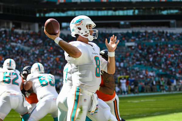 Miami Dolphins quarterback Brock Osweiler (8) throws from his own endzone