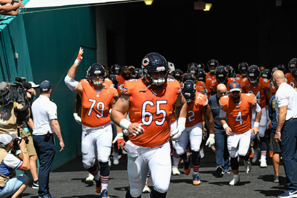 Chicago Bears center Cody Whitehair (65) leads the team onto the field