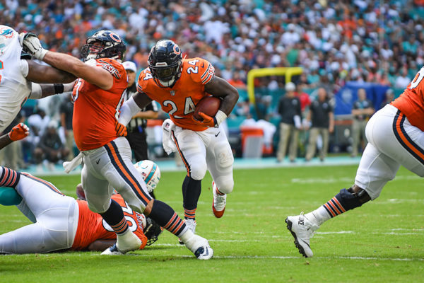 Chicago Bears running back Jordan Howard (24) uses his linemen to open holes for him to run through