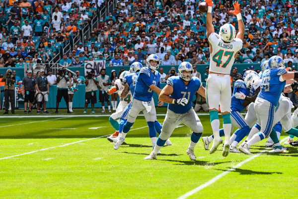 Miami Dolphins linebacker Kiko Alonso (47) tips a pass from Detroit Lions quarterback Matthew Stafford (9)