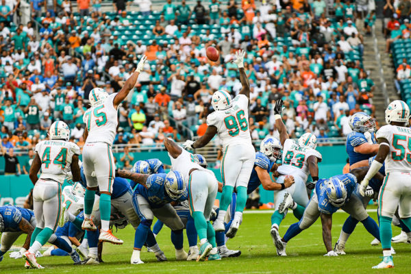The Miami Dolphins special teams tries to block the kick