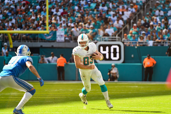Miami Dolphins tight end Nick O'Leary (83) runs after a catch