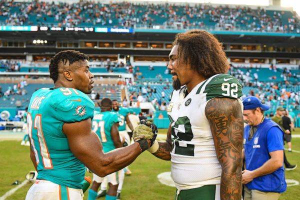 Miami Dolphins defensive end Cameron Wake (91) and New York Jets defensive end Leonard Williams (92)