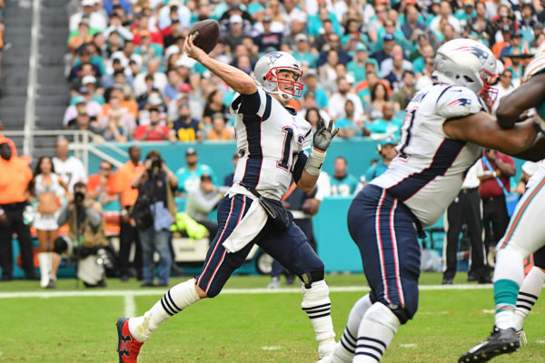 New England Patriots quarterback Tom Brady (12) throws a pass