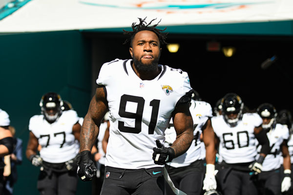 Jacksonville Jaguars defensive end Yannick Ngakoue (91) runs out of the tunnel