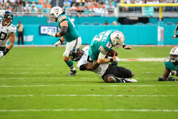 Jacksonville Jaguars defensive end Yannick Ngakoue (91) sacks Miami Dolphins quarterback Ryan Tannehill (17)