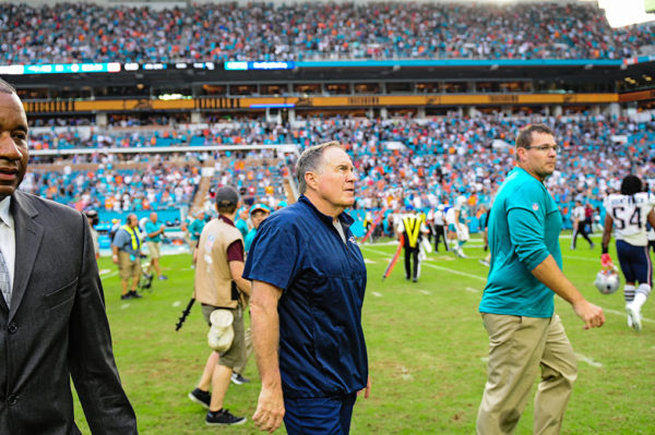 New England Patriots head coach Bill Belichick watches the Dolphins winning play on the jumbotron