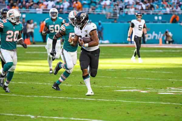 Jacksonville Jaguars running back Carlos Hyde (34) breaks free