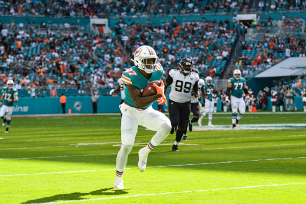 Miami Dolphins running back Kalen Ballage (27) runs up the sideline